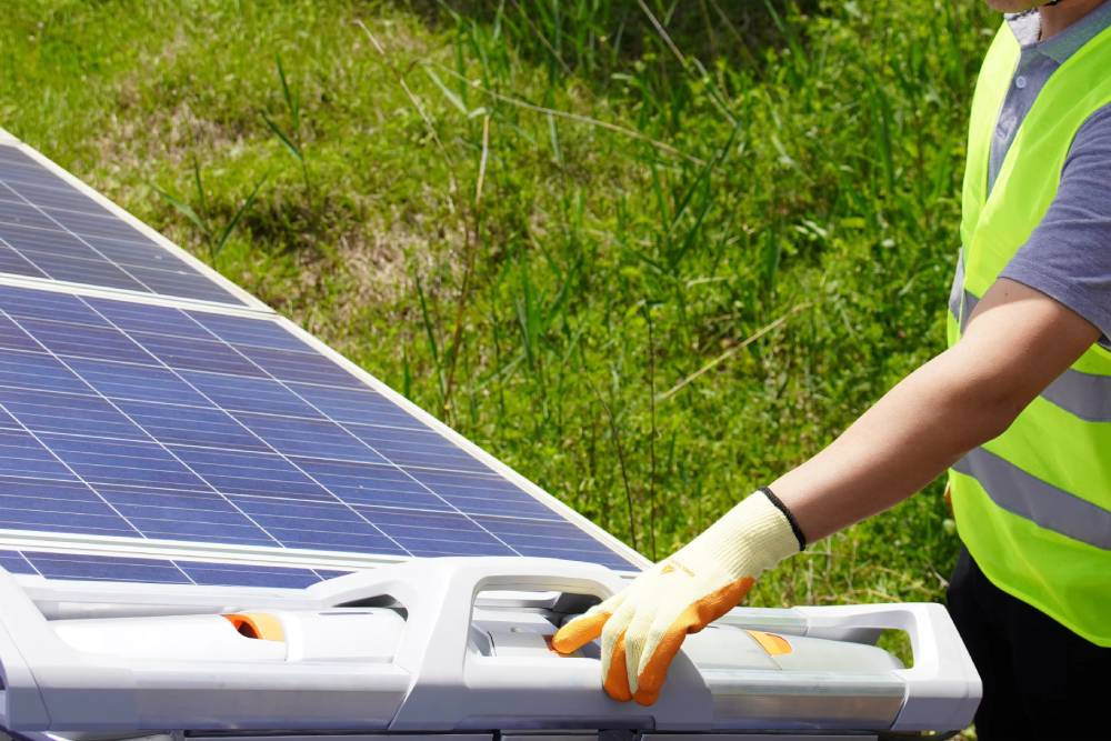Robot for Solar Panels in Arid Area Applications with Dry-Sweep PV Cleaning Performance