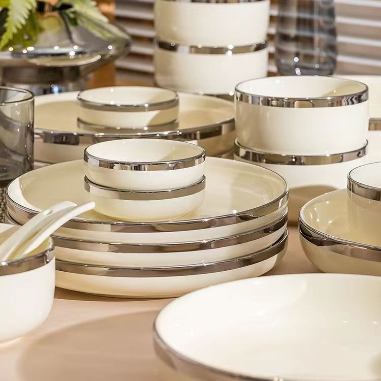 Elegant Light Yellow Ceramic Tableware Set with Silver Trim