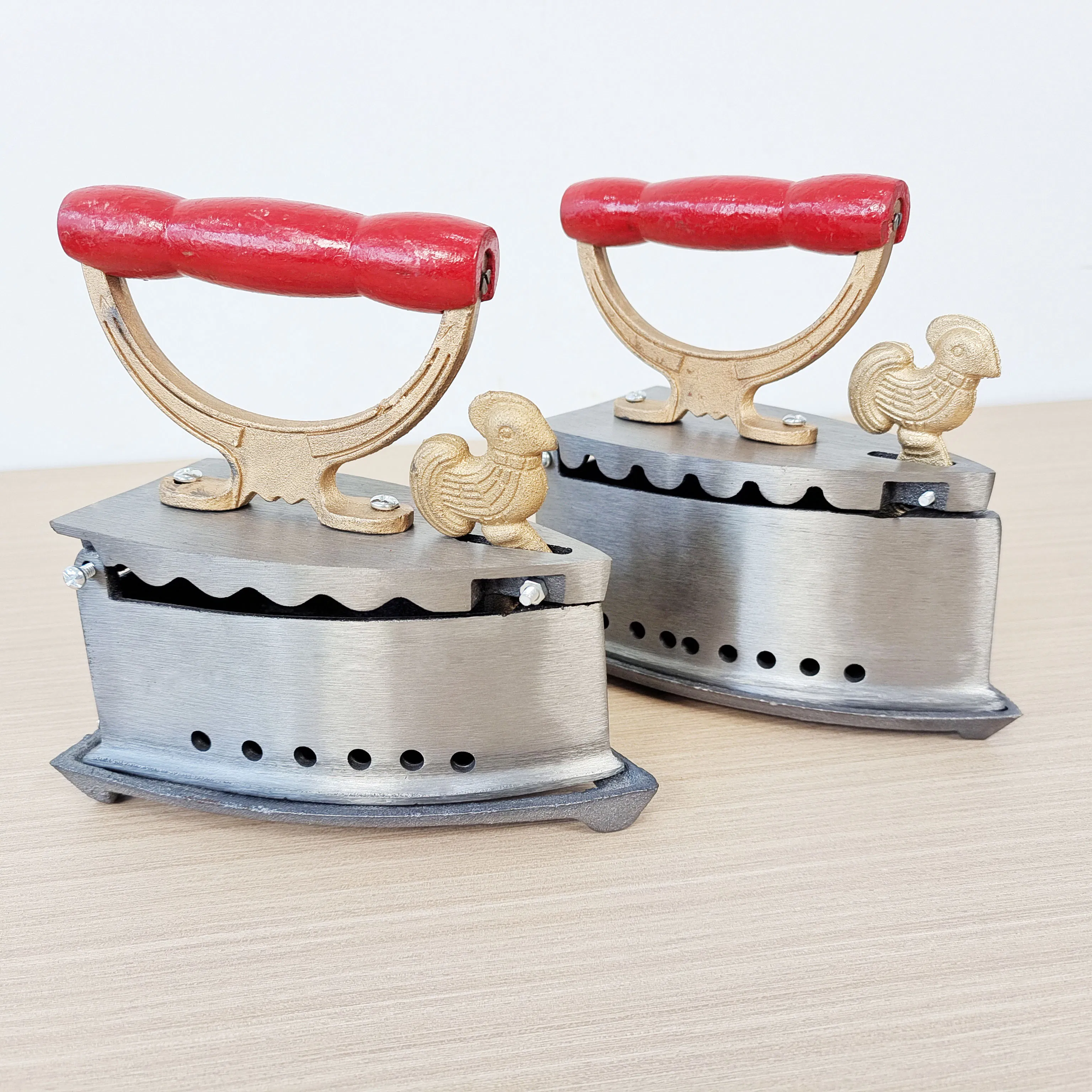 Classic Charcoal Iron with Red Wooden Handle for Everyday Use