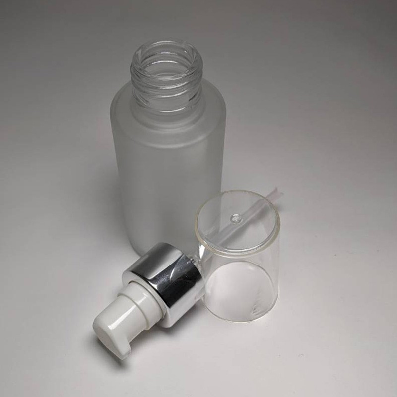 Acne Treatment Lotion Empty Glass Bottle Packaging 60ml Cylinder Shape Plastic Cream Pump Transparent Cap
