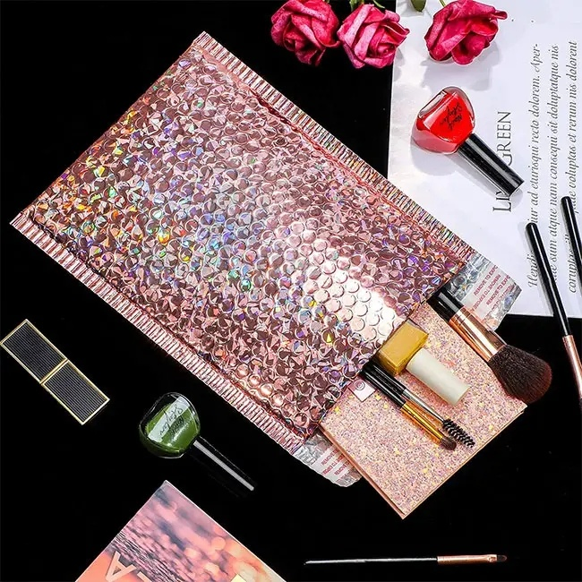 Pink Aluminum Plated Film Laminate Bubble to Produce Self-Adhesive Cosmetics Packing Bag