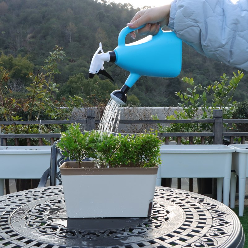 Versatile 1.3L Plastic Watering Can with Sprayer for Gardens