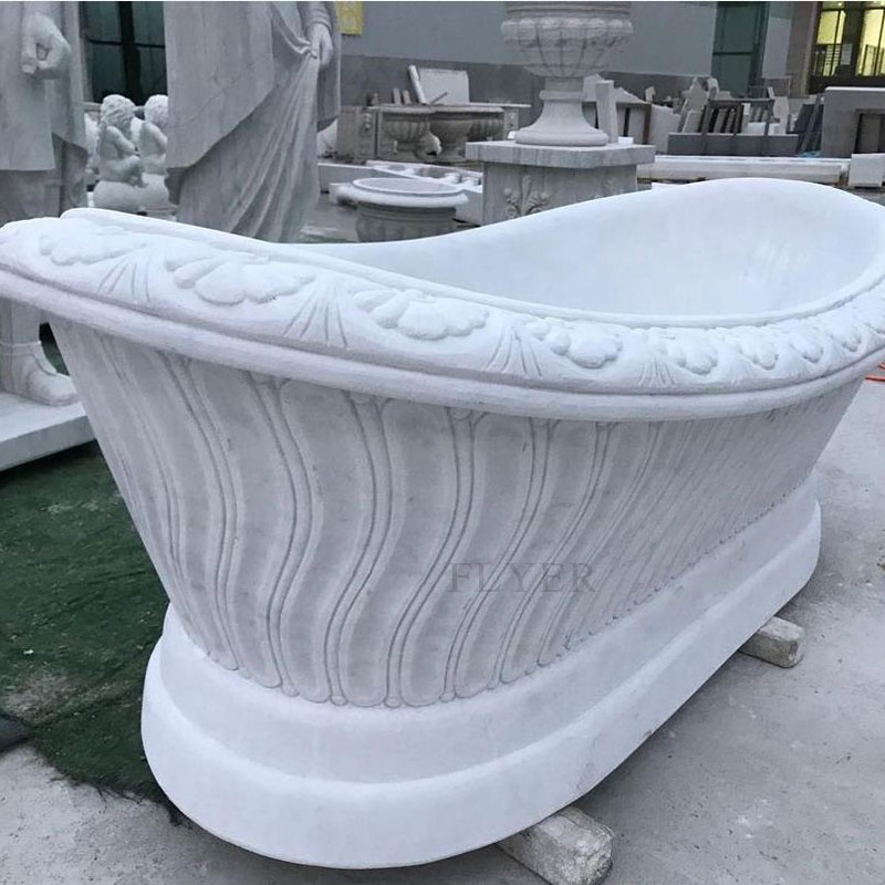 Белая мраморная ванна прямоугольная отдельностоящая