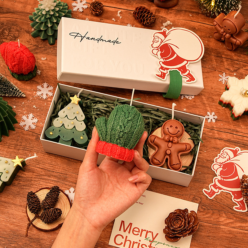 Festive Holiday Candles with Colorful Designs for Gifting