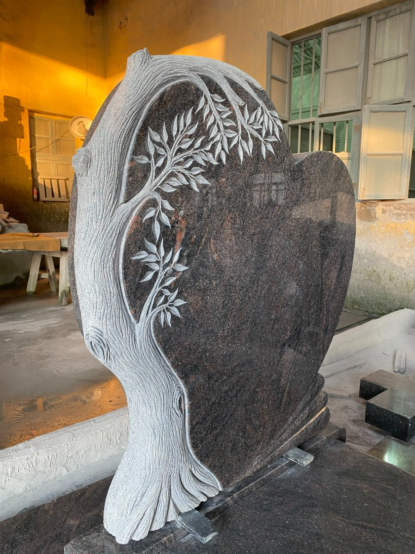 American Monuments Mahogany Granite Heart Shape Headstone with Carved Tree Mohagony