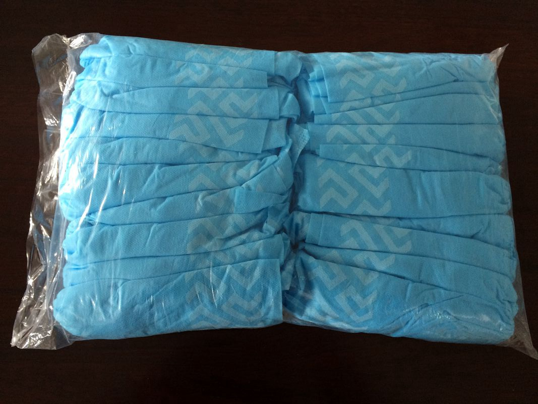 China Manufacturer PP Non Woven Waterproof Anti Slip Shoe Cover