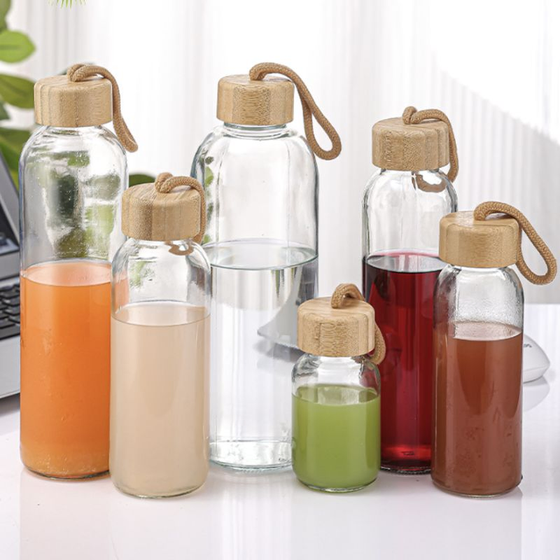 Стеклянная бутылка для воды с бамбуковой крышкой