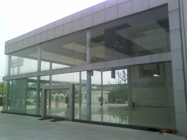 Professional Design Light Steel Structure Commercial Building with Glass Facade