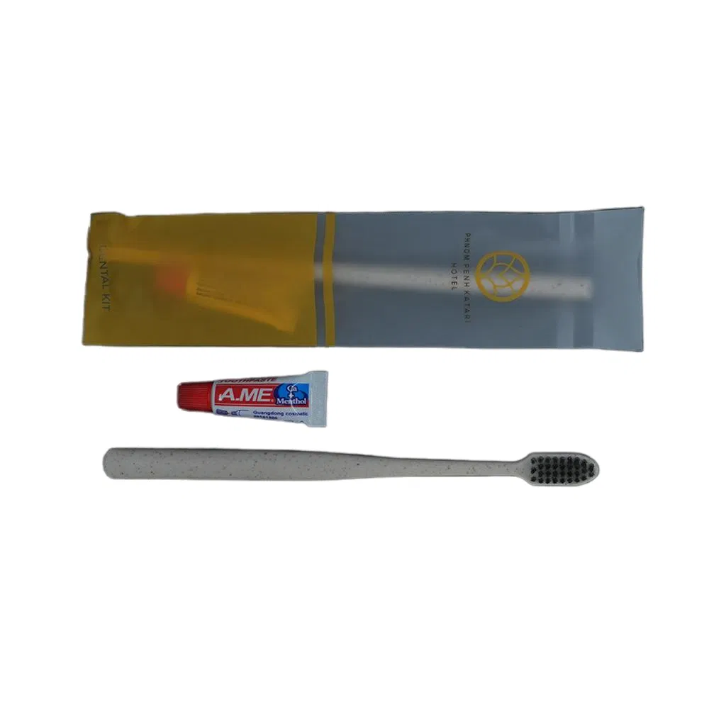 Toothbrush and Toothpaste in Plastic Packing with Hotel Amenities for Guest Room