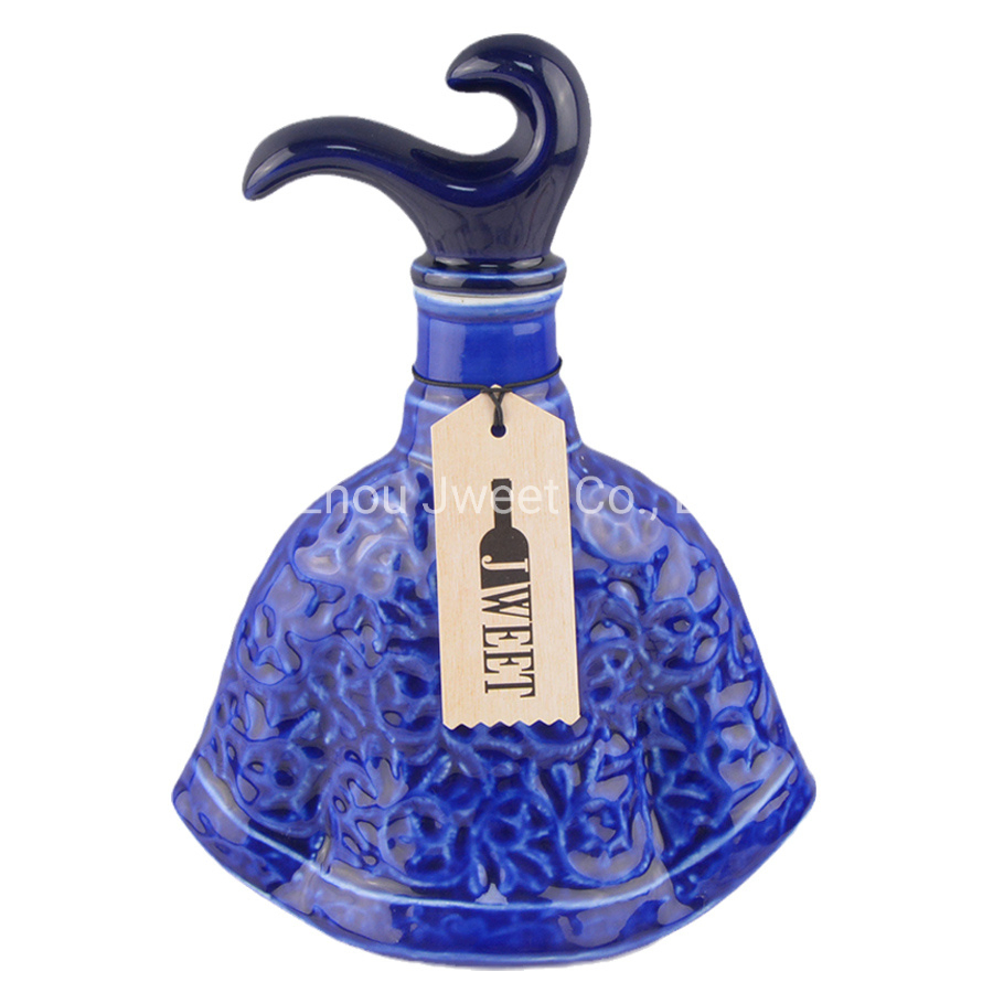 Irregular Shape Glazing Blue Embossed Porcelain Bottle for Wine