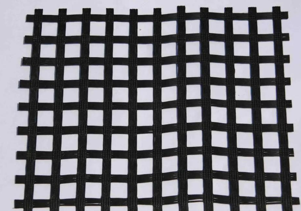 China Gravel Grid 20kN 30kN 40kN Biaxial PP/Polypropylene Plastic Geogrid for Road Reinforcement Low Price