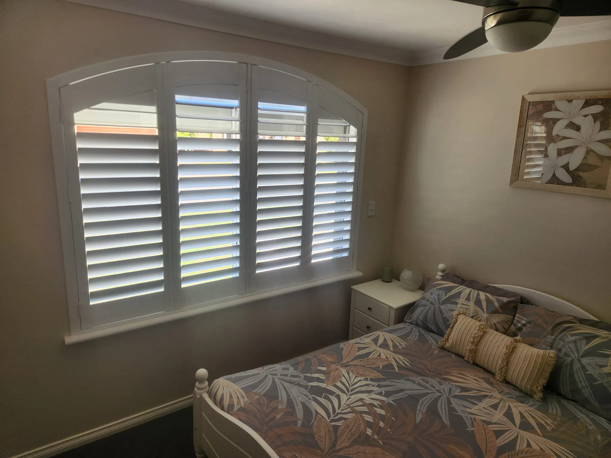 Beautiful Arch and Bay Window Plantation Shutter