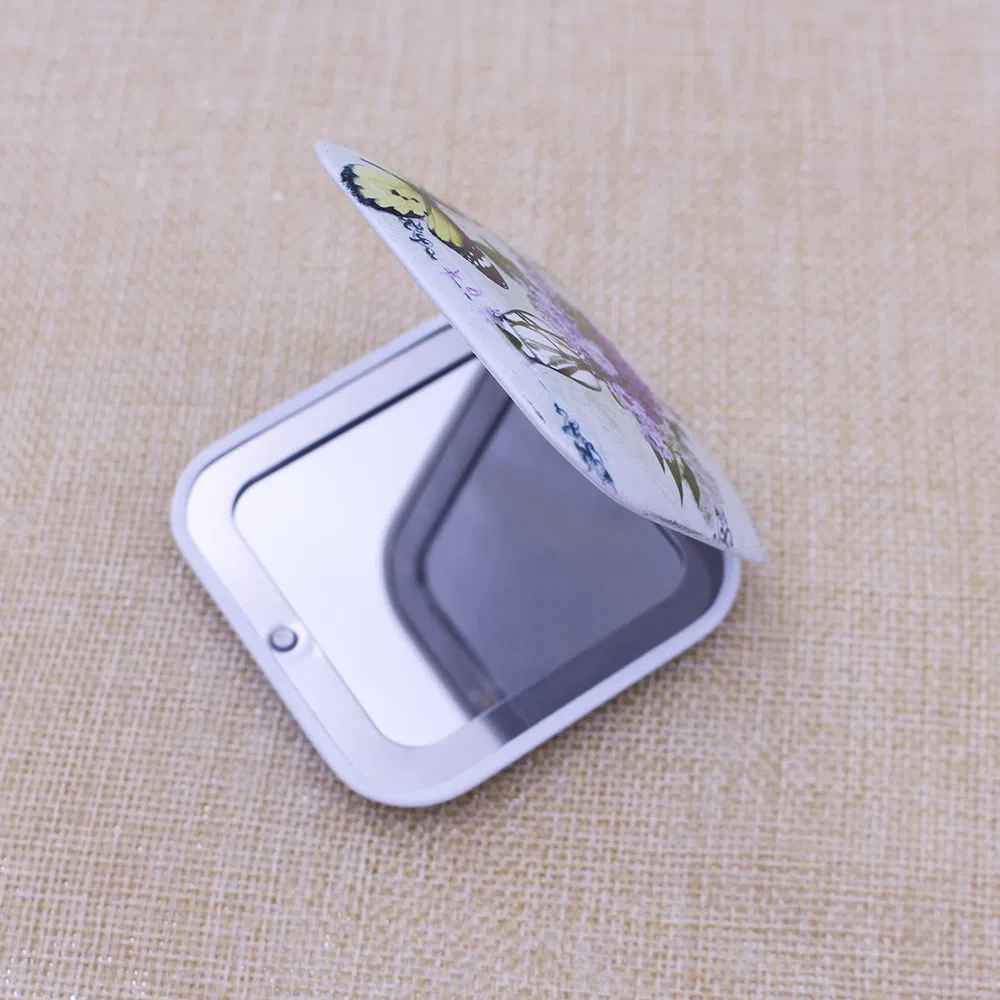 Elegant Metal Pocket Mirror with Reflective Cosmetic Surface