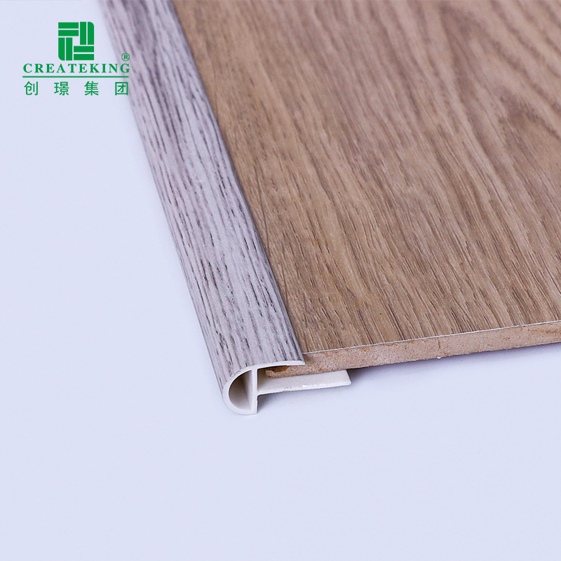 China Factory Hot Selling 40*20mm Q-Shaped Wood-Grain PVC Arc Stair Nosing Profiles