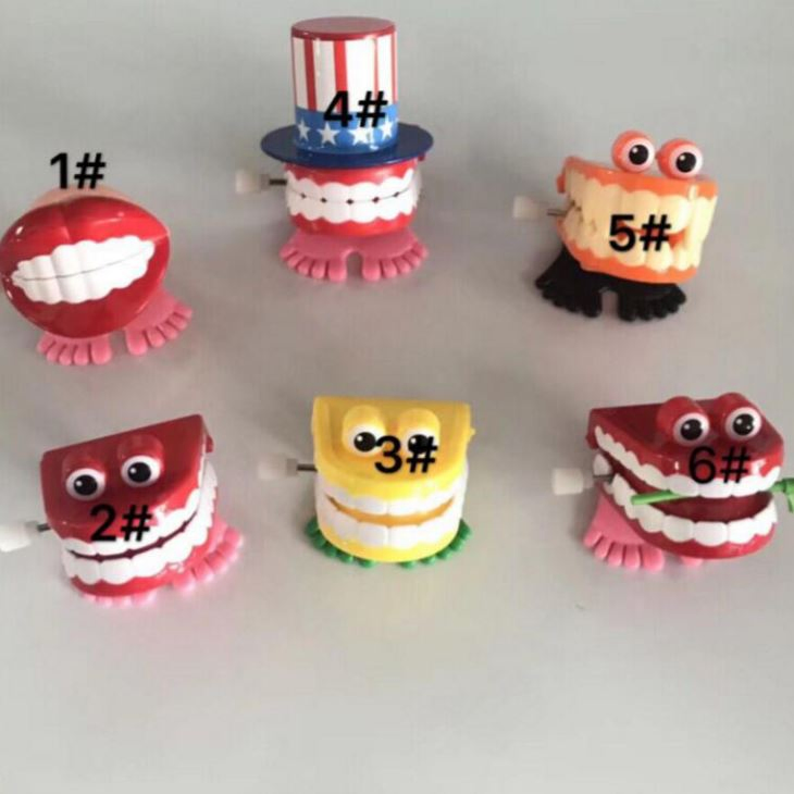Wholesale Custom Cartoon Tooth Toys Plastic Wind-up Jumping Teeth for Dental Gifts