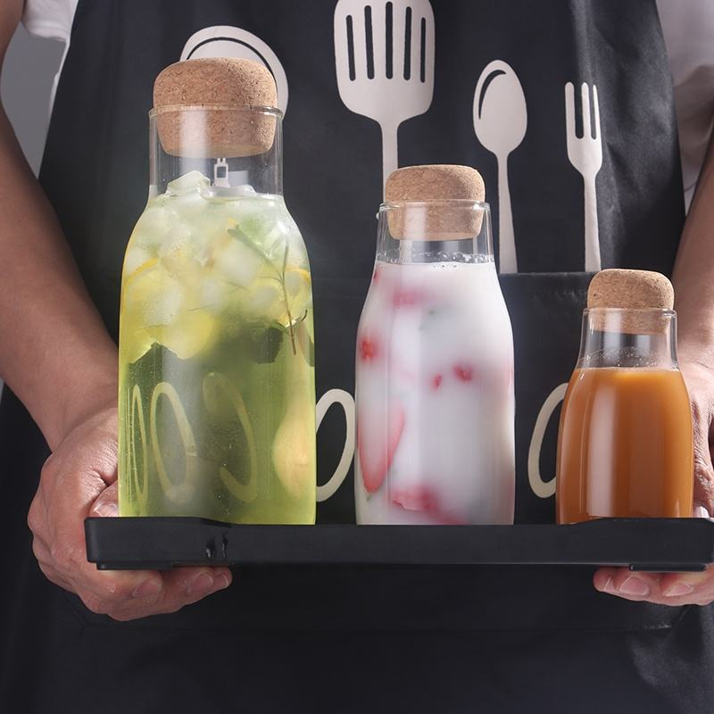 Factory Supply Transparent Glass Juice Bottles for Liquid and Food Storage