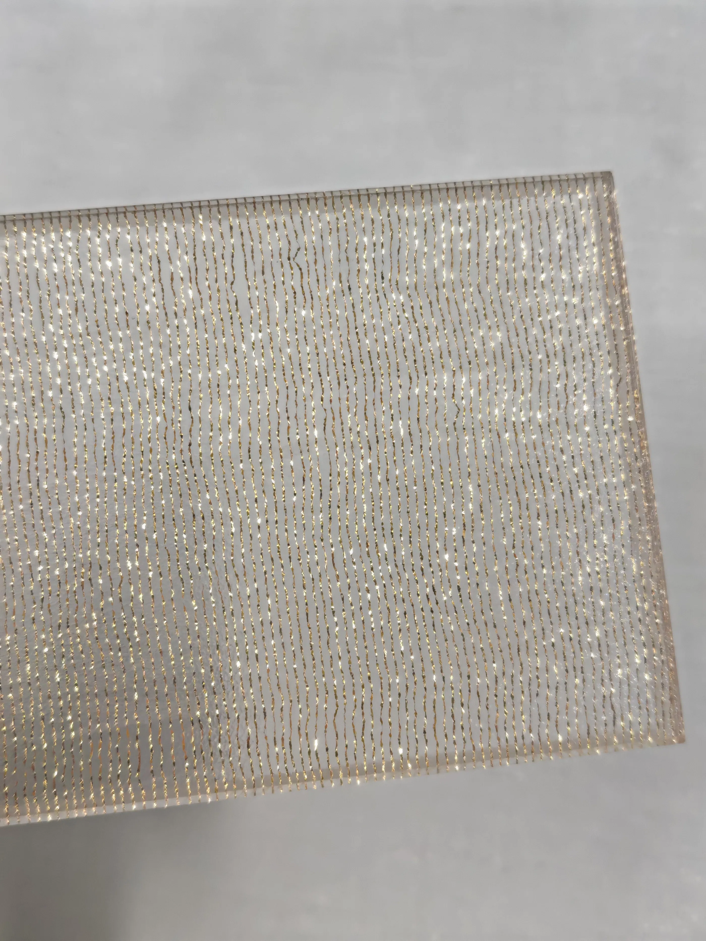 Elegant Laminated Glass Solutions with Decorative Artistic Fabric Design