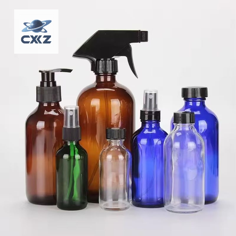 Амбровые стеклянные бутылки Boston Round с бакелитовой крышкой