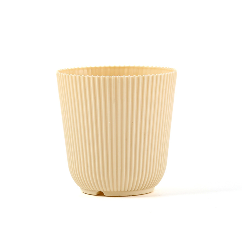Круглый цветочный горшок с вертикальными полосками
