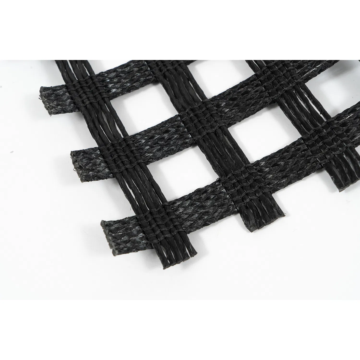 China Geogrid Pet Pes Geogrid Polyester Geogrid Pet Biaxial/ Uniaxial Geogrid in Slope Protection/Reinforcement Polyester Woven Geogrid