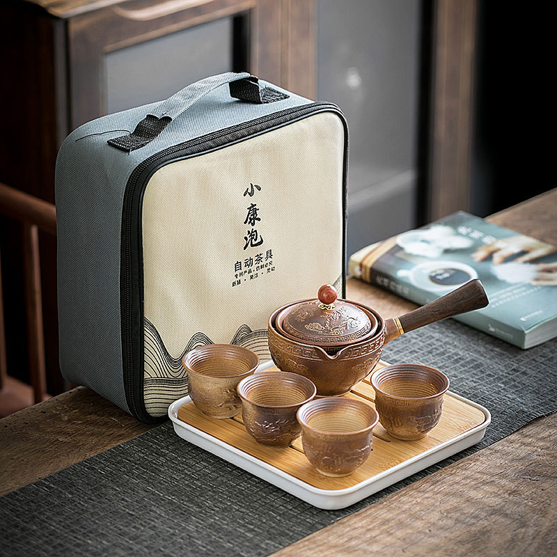 Competitive Price Porcelain Magic Teapot Ceramic Portable Travel Tea Pot Tea Cups with 360 Rotation Tea Maker and Infuser Semi Automatic Tea Set for Outdoor