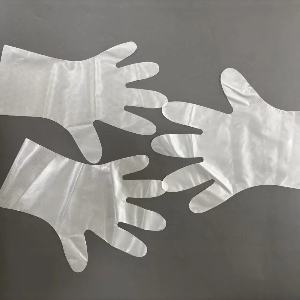 Long-Cuff CPE Disposable Gloves to Protect Wrists During Cleaning and Washing Tasks.