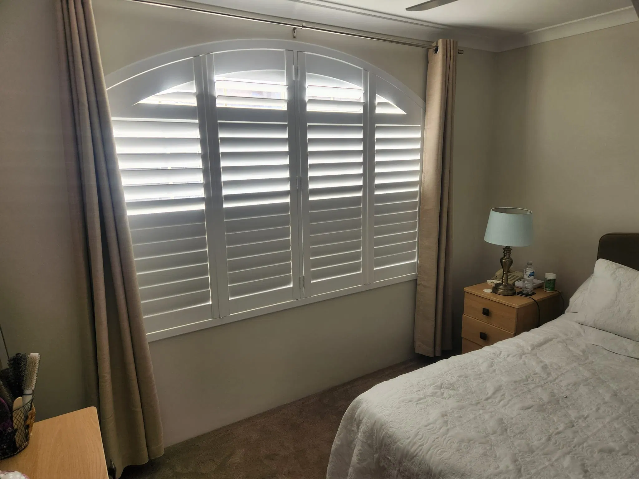 Beautiful Arch and Bay Window Plantation Shutter