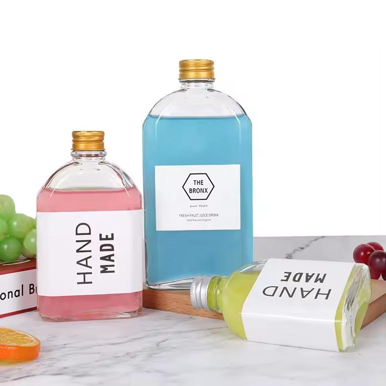 Customized Glass Beverage Bottle Alcohol Juice Drinks Wine Liquor Glasses with Screw Caps