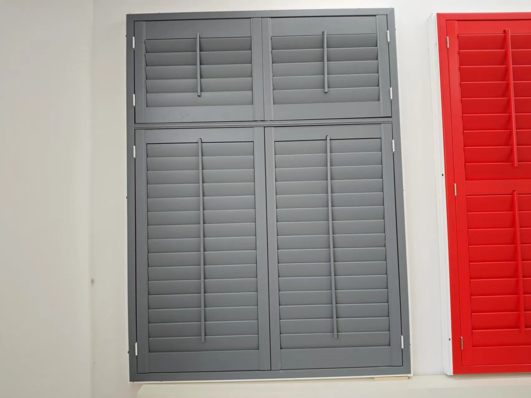 Tier on Tier Window Shutters with a Horizontal Tpost
