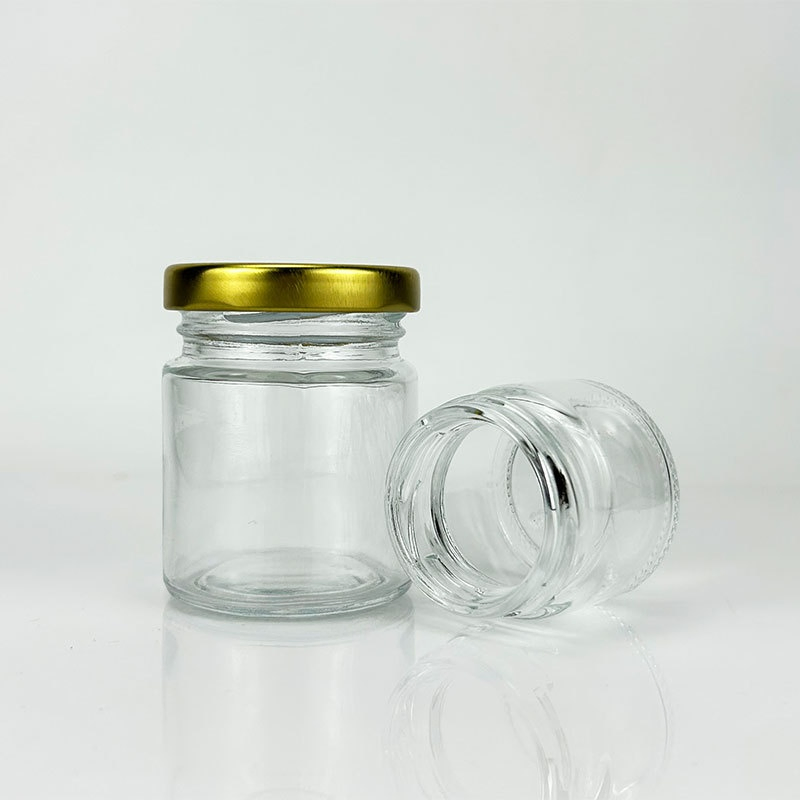 Hot Sale 50ml 80ml Mini Glass Jar Honey Jar Fashion Mason Jar Pickle Jam Honey Food Storage Round Empty Glass Jar with Metal Lid