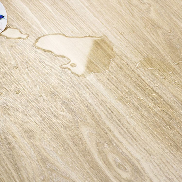 Водостойкий SPC ламинат Елочка, цвет Дуб