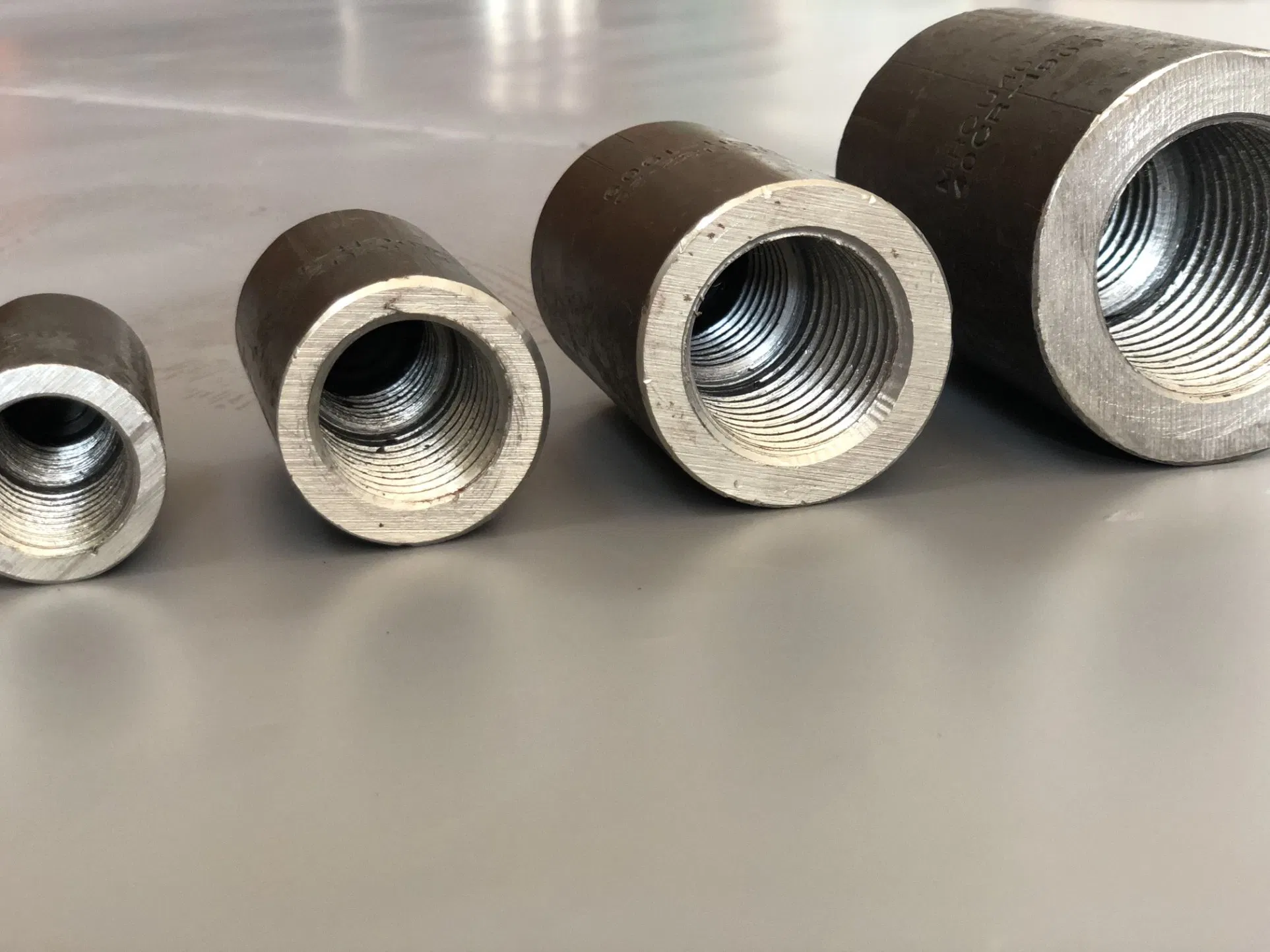 Adto Mechanical Parallel Thread Transition Rebar Coupler in Construction Sites