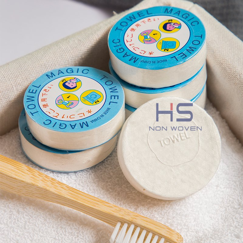 Portable 10PCS/Tube Packing 100% White Spunlace Non-Woven Fabric Round Disposable Magic Compressed Coin Towel Tablets