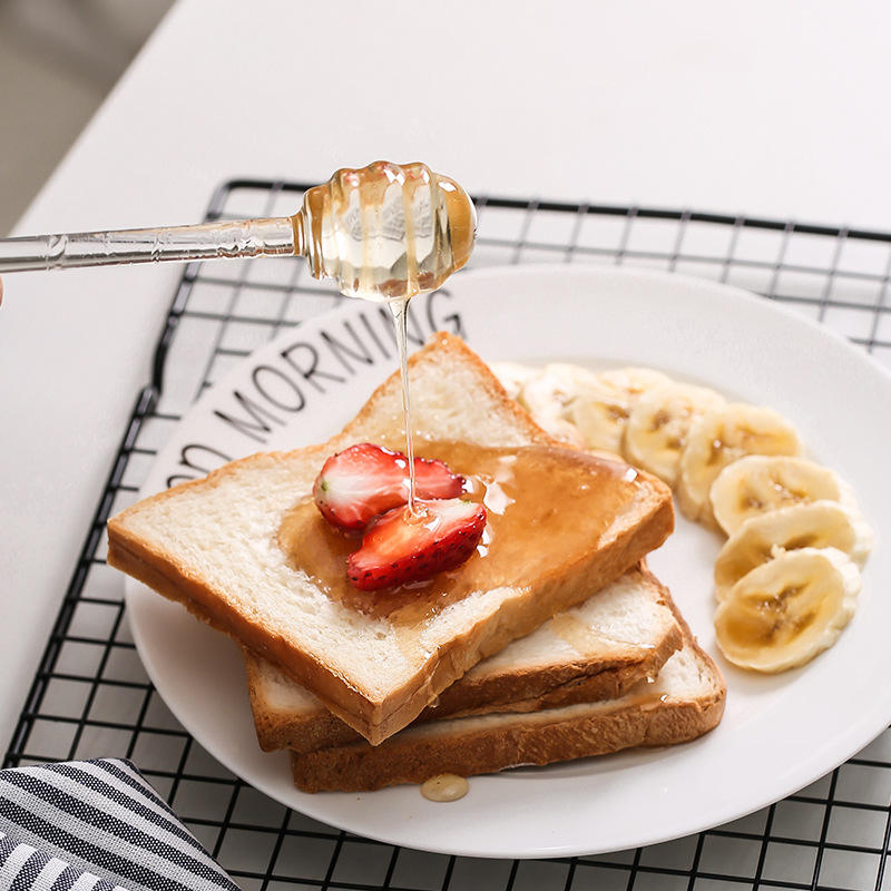 Transparent Glass Spoon for Manual Dipping of Honey and Jam