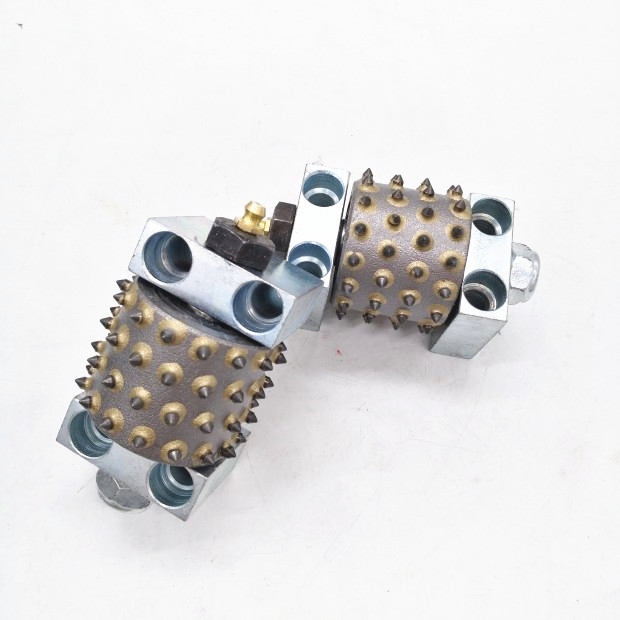 240mm Diamond Bush Hammered Rollers on Klindex Grinder