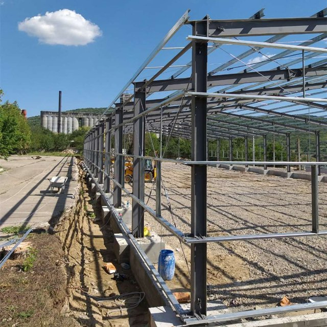 Prefab/Prefabricated Customized Large Span Storage/Workshop/Warehouse Structural Metal Frame Construction Structure Building Steel with Oversea Installation