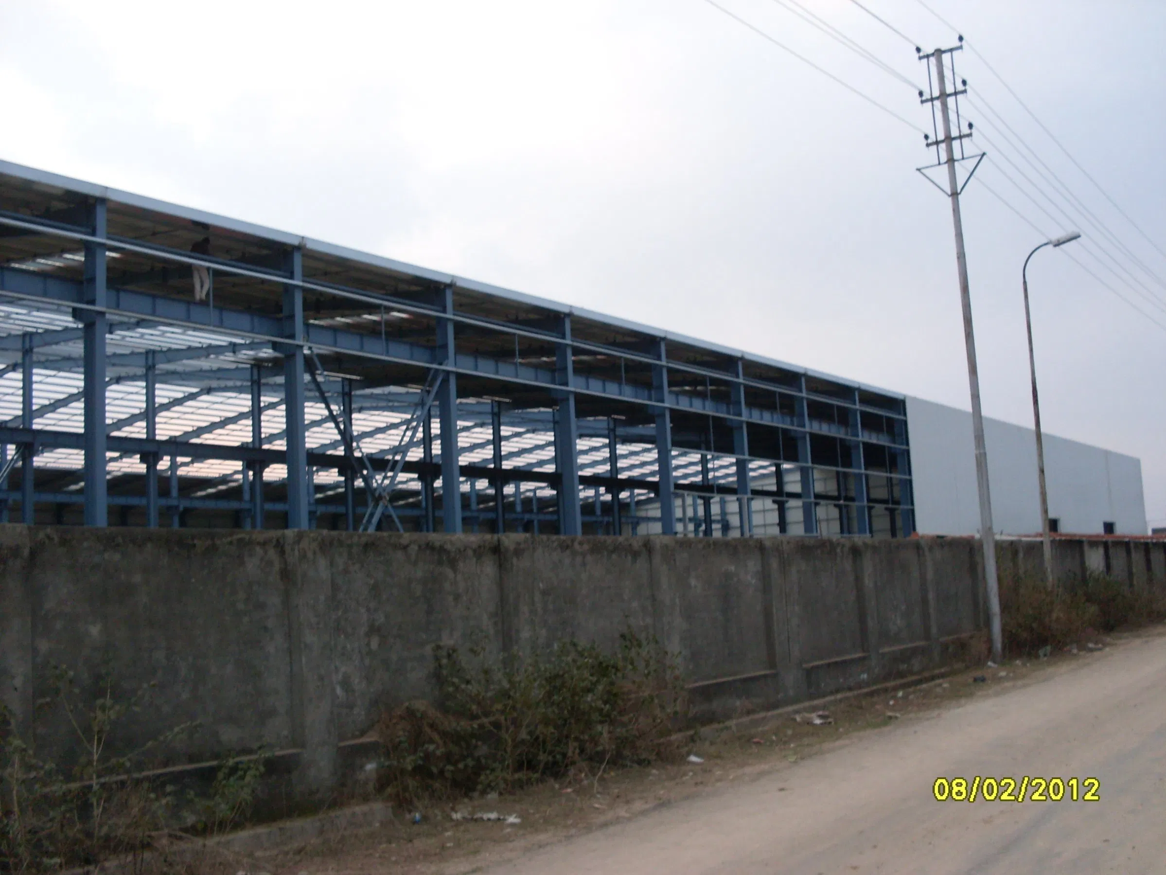 Modern Prefab Steel Structure Building Prefabricated Warehouse/Workshop/Aircraft Hangar/Office Construction Material