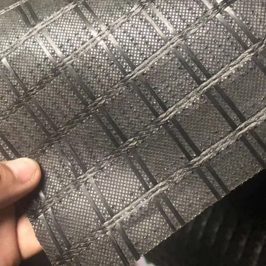 China Factory OEM Building Material Fiberglass Geogrid Composite Polyester Geogrid for River Slop Protection