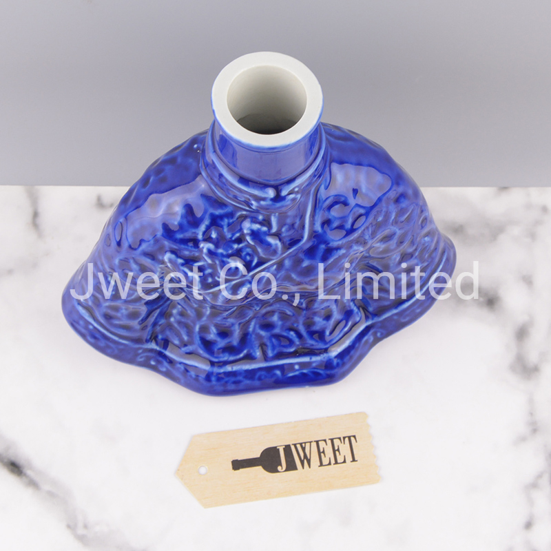 Irregular Shape Glazing Blue Embossed Porcelain Bottle for Wine