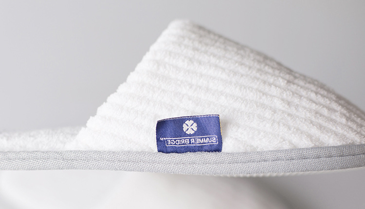 Premium Custom Embroidered Disposable Slippers for Bulk Purchase
