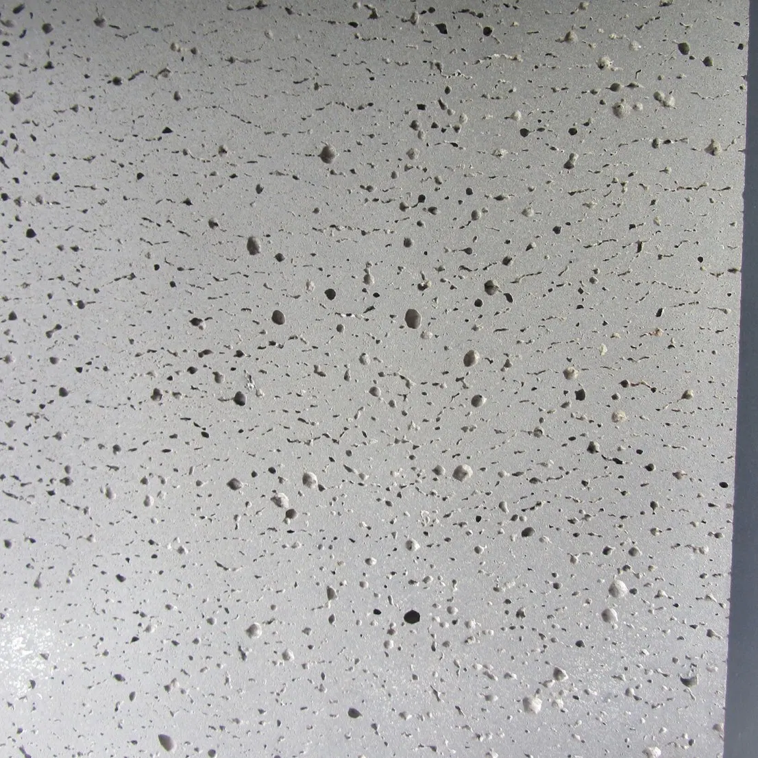 Hainan Grey Black Lava Stone Basalt with Holes for Paver Flooring
