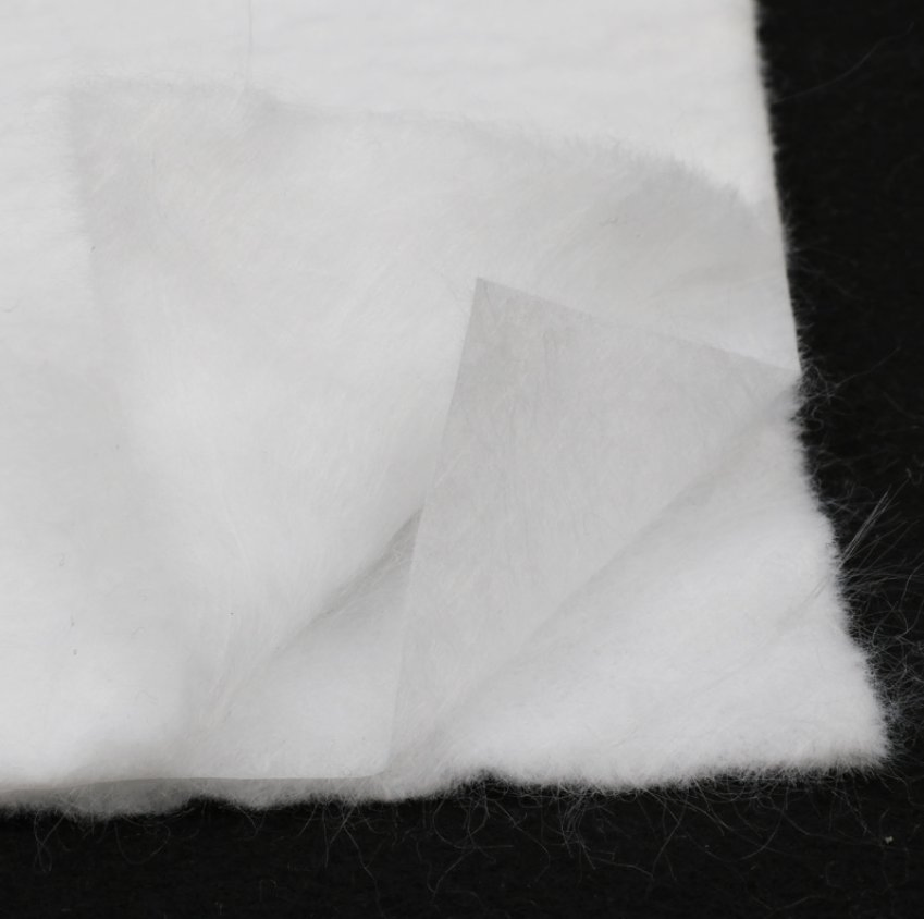 Antiseepage Short Fiber Composite Geomembrane for Artificial Lake