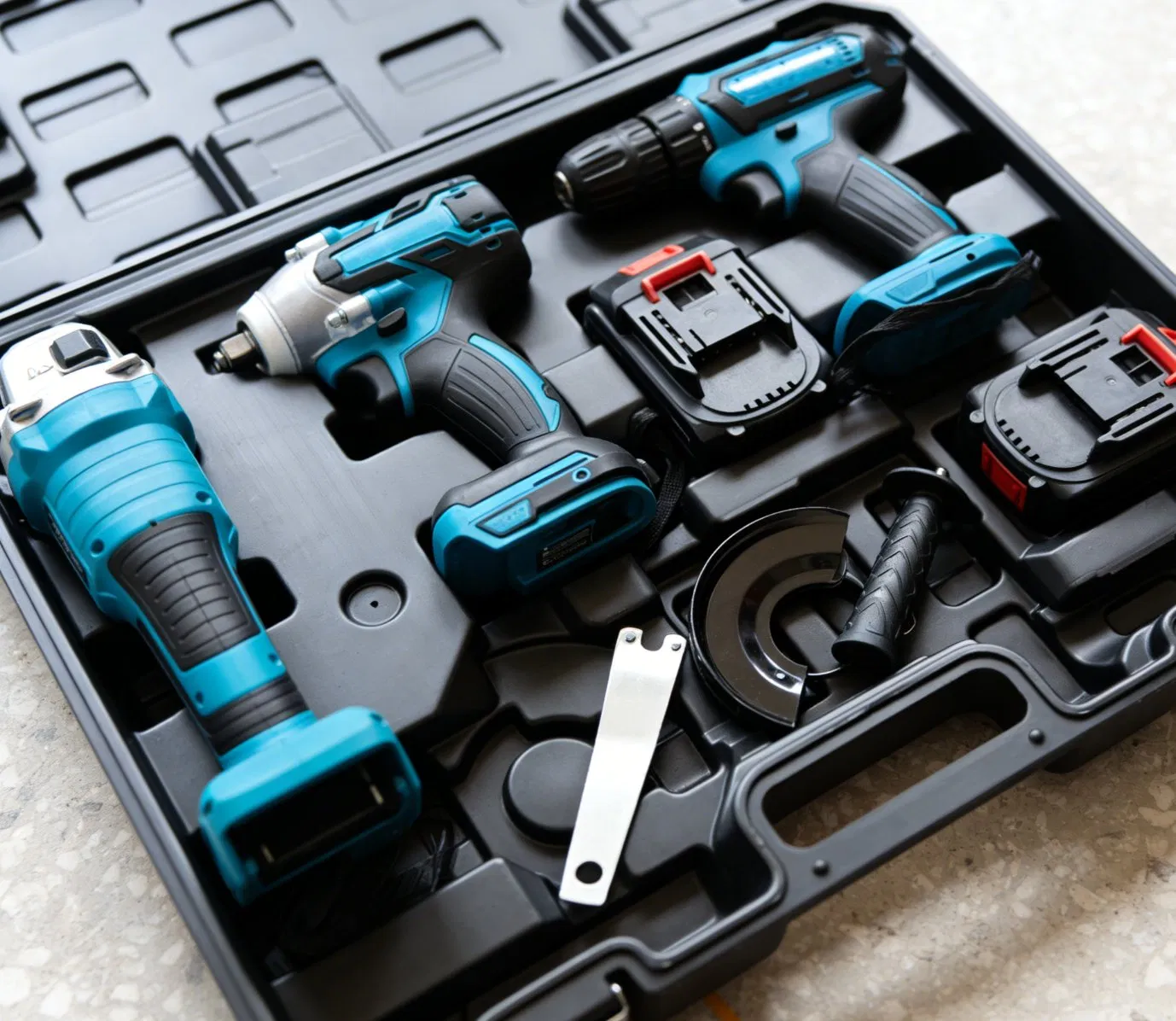 Versatile Power Tool Set: Drill, Impact Wrench, and Grinder