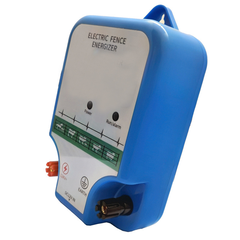 High Voltage Pulse Fence Energizer for Cattle, Pigs and Sheep Breeding in Electric Fence of Pasture Farm. Animal Husbandry Power Grid Prevents Wild Boar