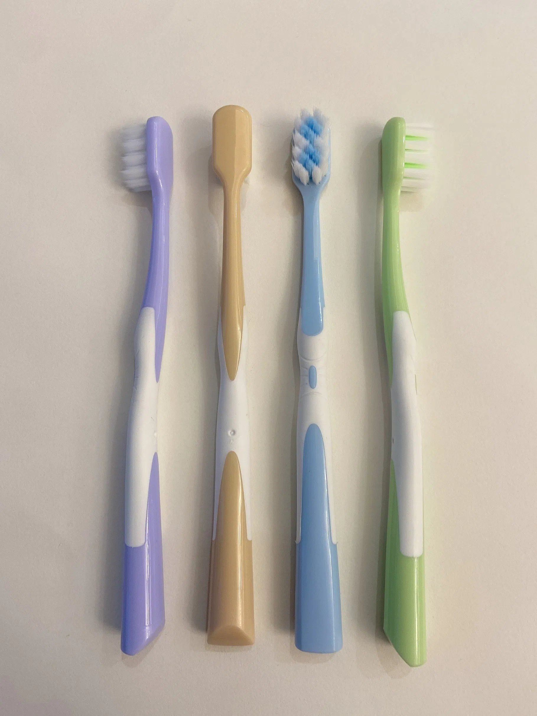 FDA Ultra Soft Square Tufting Holes PP+TPE Adult Toothbrush