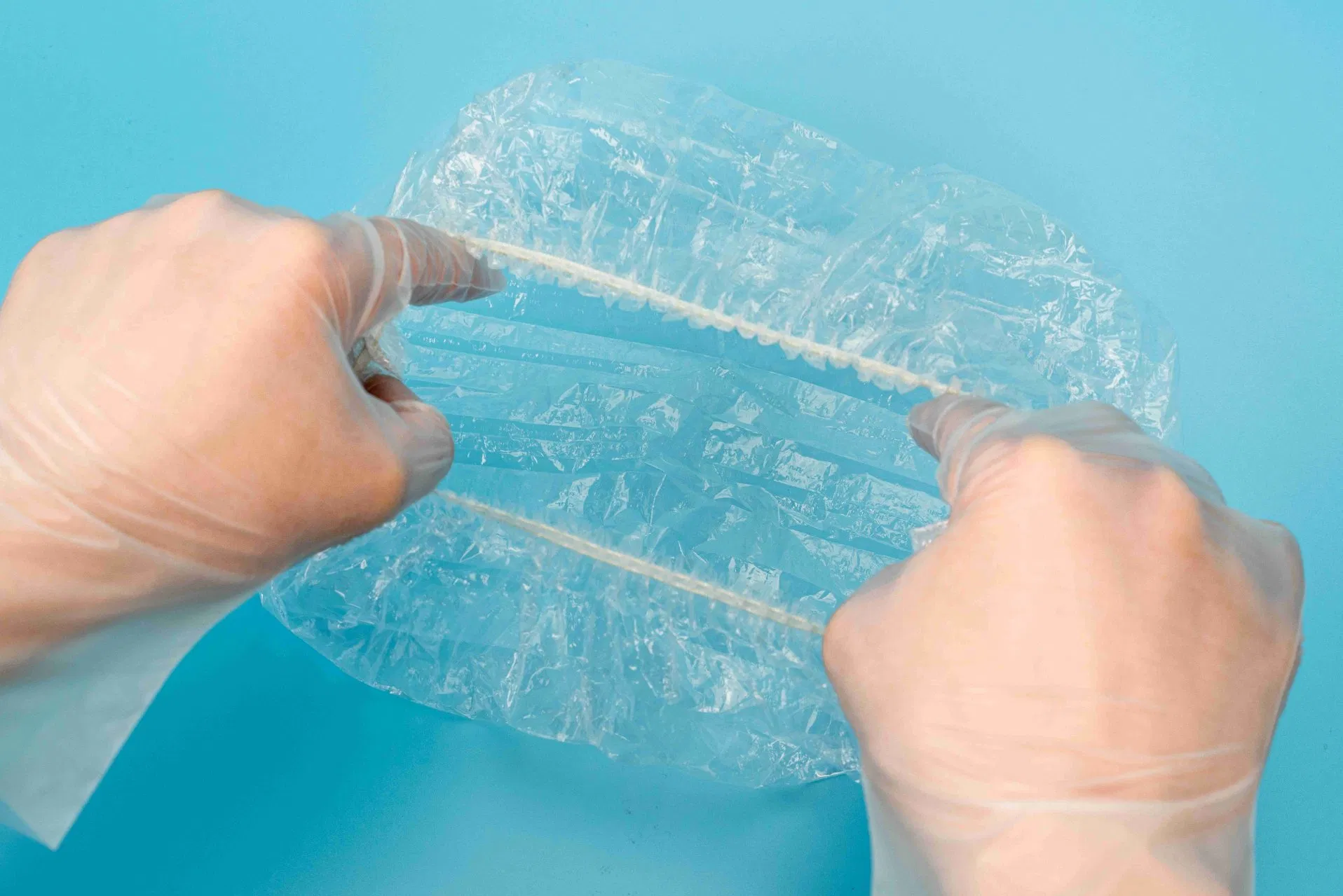 PE Disposable Waterproof Shower Cap for Hotel/Home Use Made by Hand