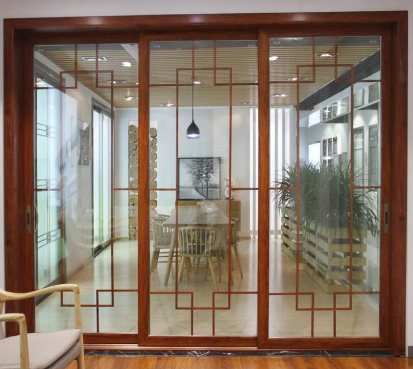 Australia Standards Wood Grain Color UPVC Vinyl Sliding Glass Door with Decorative Grill