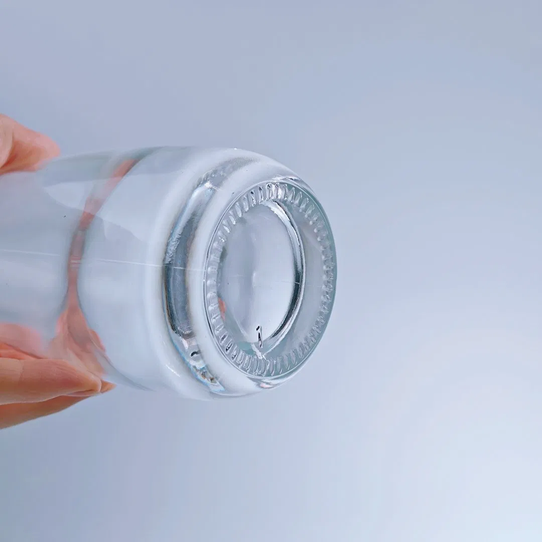 Wholesale 330m 500ml Drop Shape Mineral Glass Water Bottle Purified Glass Water Bottle with Aluminum Cap