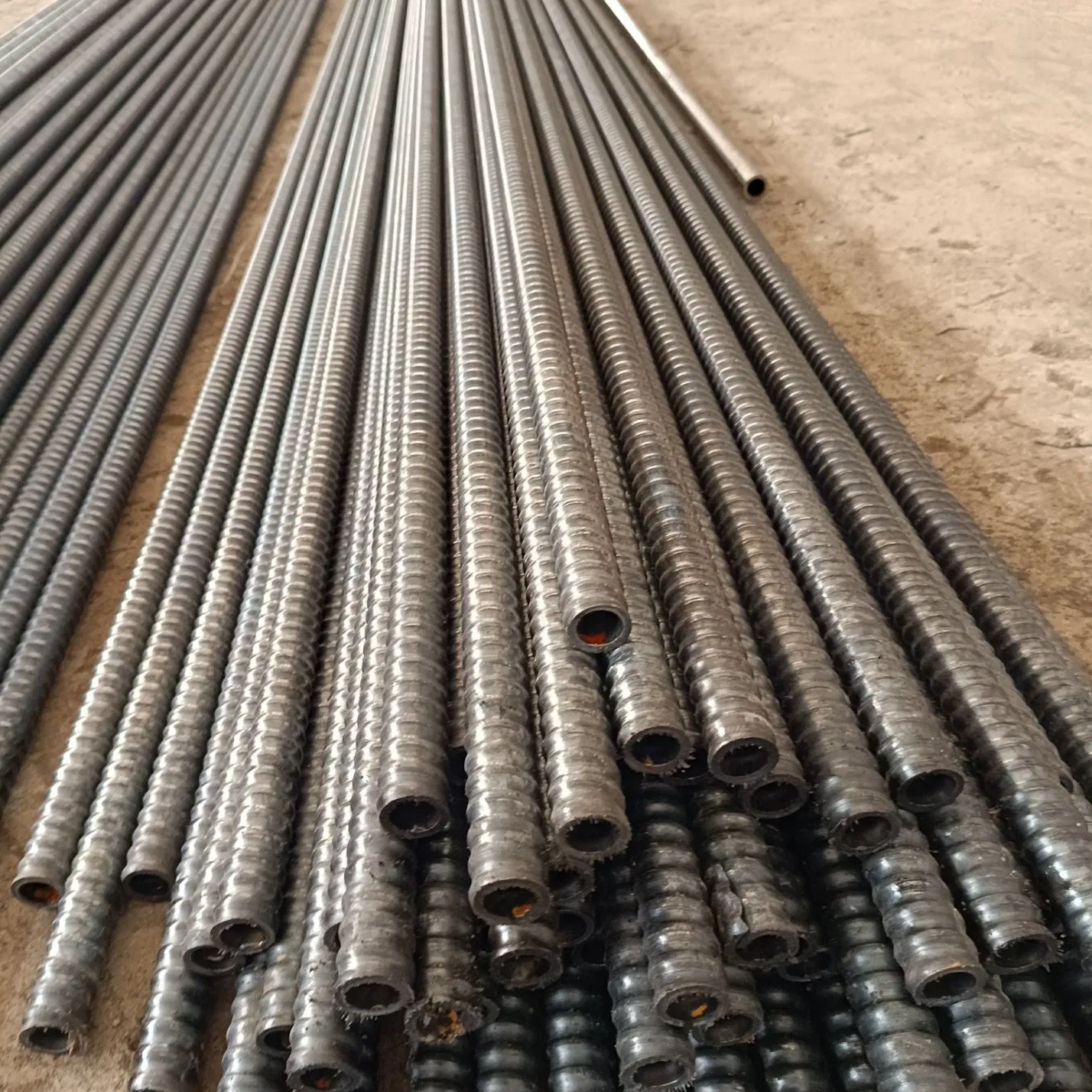 Self Drilling Anchor Bolt for Tunnel R32mm/R25mm/R51mm with Drill Bit for Rock and Soil Soil Nail