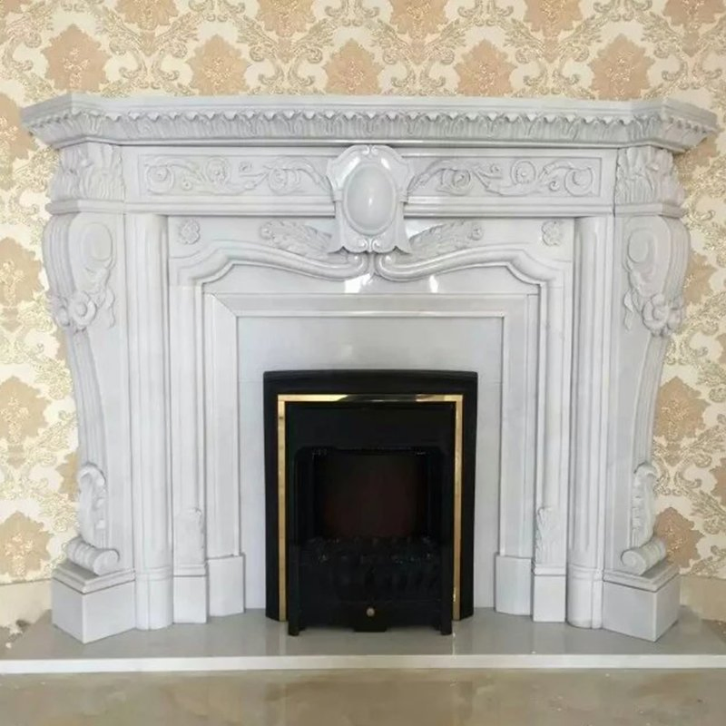 Камин из белого мрамора ручной работы